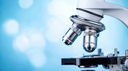 Poster - modern microscope on blurred blue background