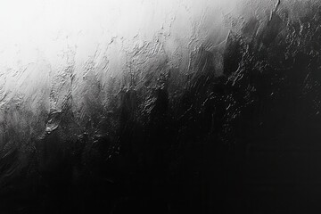 Poster - Water droplets collect on a smooth black surface, showcasing contrast against a white background in a dynamic abstract composition created in natural lighting