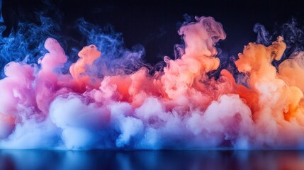 Leinwandbilder - Vibrant smoke fills the air with swirling colors of pink, blue, and orange during a creative visual display at a studio event in the evening