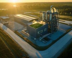Poster - Aerial view of a modern industrial facility surrounded by greenery, showcasing sustainable technology in manufacturing