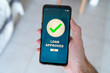 © Kevin - Loan approved notification on smart phone.