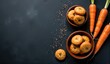 © Happiness  Factory - Overhead shot of orange baked goods in bowls and fresh carrots on a dark background. Perfect for food blogs and recipe sites.