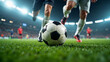 © Arra Vais - Close-up view of soccer players in action during a night match, with a focus on the ball on a green grass field under stadium lights