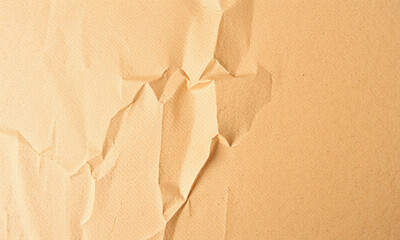Poster - Crumpled kraft paper texture with warm beige tones, showcasing natural imperfections and depth, ideal for backgrounds or craft projects