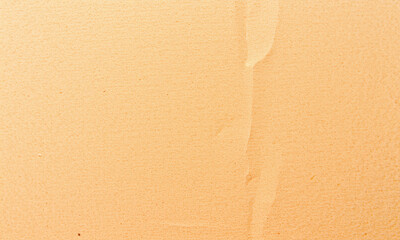 Poster - close up view of textured kraft paper showcasing warm beige color with subtle variations and imperfections, evoking sense of natural simplicity and warmth