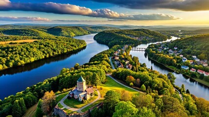 Aufkleber - Serene river landscape with a charming chapel nestled on a hilltop at sunset