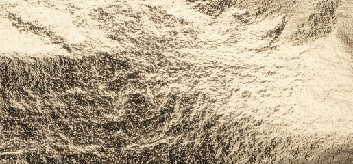Poster - Elegant, crumpled foil in champagne gold and brass, with a reflective, textured surface. A chic, vintage pattern with grunge and ragged effects, creating a luxurious, old-world treasure feel
