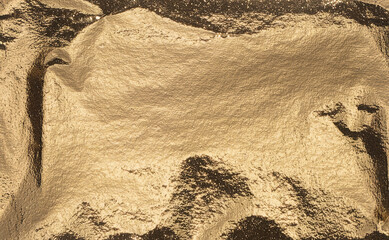 Aufkleber - Golden metallic foil texture with a shimmering sparkle effect. Abstract retro design, reflecting light, creating a rich, luxurious holiday feel. Perfect for New Year and Christmas backgrounds..