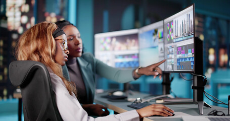 Fototapete - Late Night African American Woman Video Editor