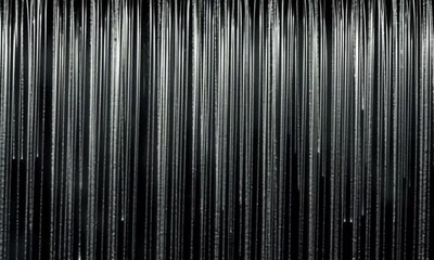 Poster - Seamless Animation of Rain Droplets on Glass Pane with Light Streaks Creating a Soft Diffused Effect made with Generative AI technology