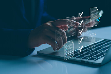 checklist business performance monitoring concept, businessman doing online survey filling out check