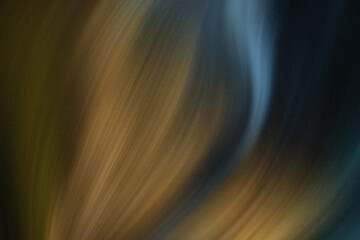 Poster - Abstract blurry background with shades of blue and gold creating a soft and ethereal effect