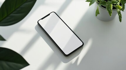Leinwandbilder - Sleek modern smartphone on a white surface with soft lighting and minimalist aesthetics showcased in a clean setting