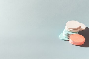 Poster - vibrant flat lay of monochrome game tokens and neatly stacked cards placed on clean gray surface under soft lighting