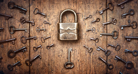 Fototapete - Antique door locks and keys on an old background. Old padlock and key. set as a symbol of security, closeness, history, protection, safety etc. Conceptual background.