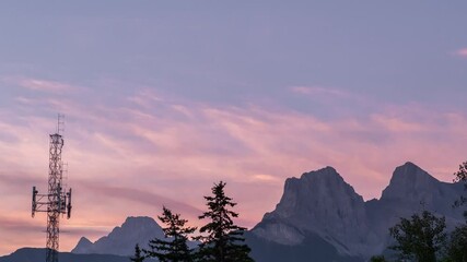 Wall Mural - sky and mountain timelapse. a cloudy morning atmosphere in the summer season. natural landscape back