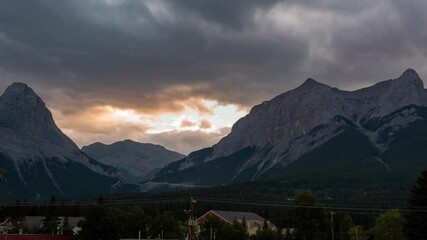 Wall Mural - sky and mountain timelapse. a cloudy morning atmosphere in the summer season. natural landscape back