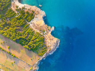 Wall Mural - drone view of the sea coast. rocky shore and sea water. vacation and travel. summer seascape. aerial