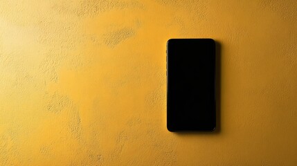 Poster - Top view of modern phone with black blank screen on yellow surface, creative flat lay with vibrant copy space