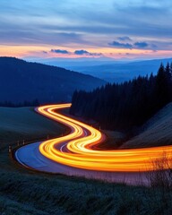 Poster - Winding road illuminated by car lights at dusk through a forested mountain landscape with a colorful sky and a sense of movement
