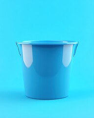 Poster - Minimalist blue bucket on a vibrant azure background creating a clean and modern aesthetic for various design projects