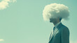 © Roberto - Surreal digital art of a man in a business suit whose head is replaced by a fluffy white cloud against a green background.
