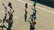 © Jacob Lund - Aerial view of diverse group jogging during a race event