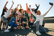 © Jacob Lund - Group of runners taking a cheerful selfie after community run