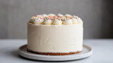 delicious cake with white frosting and colorful sprinkles, perfect for celebrations