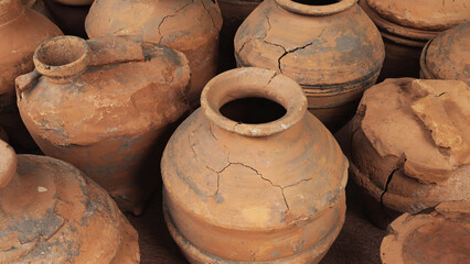 Poster - A collection of ceramic pots arranged together on a surface