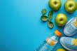 © mobile - Fitness Essentials Green Apples Water Bottle Stylish Sneakers on Blue Background Healthy Active Lifestyle