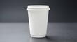 © Rika - An Isolated White Paper Coffee Cup With Its Lid On Display