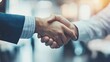 © phianguma - Business Partnership Handshake in Modern Office Environment
