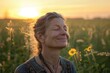 © Baba Images - Backlit Portrait of calm happy smiling free woman with closed eyes enjoys a beautiful moment life on the fields at sunset