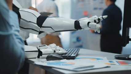 Poster - a robotic arm extends towards a digital display, highlighting cutting-edge technology in a modern of
