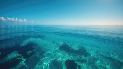 Poster - Vertical front view of a tranquil landscape featuring a blue sea and sky blue backdrop during a calm morning in summer. Tropical nature highlighting beautiful ocean waters and an exotic horizon for...