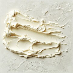 Aufkleber - Smooth buttercream spread on a light textured background with artistic swirls and lines created during application