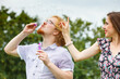 © Voyagerix - Couple blowing soap bubbles, having fun