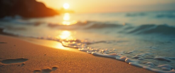 Poster - Golden sand and gentle ocean waves at sunset create a tranquil seascape