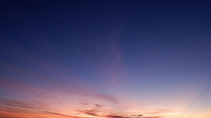 Wall Mural - 4K: Sunrise sky with colorful clouds in a time-lapse video showcases the beauty of nature's transitions. Sky background. Timelapse.
