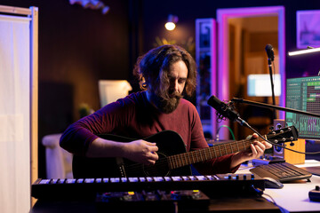 Aufkleber - Musician with condenser microphone creating a song on guitar, working on mixing and mastering tunes. Artist audio engineer recording music and adding sound effects in post production, acoustics.
