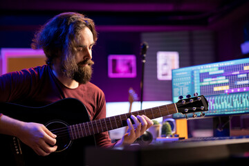 Aufkleber - Skilled musician playing acoustic guitar and recording new tunes to use for mix and master techniques in home studio. Composing modern music with digital audio workstation software, audio gear.