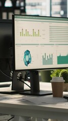 Poster - vertical video modern office workspace desk with computer monitors displaying graphs, charts and dat
