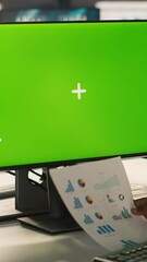 Poster - Vertical video Green screen PC used by employee preparing for business meeting. Close up of mockup computer used by african american worker doing research analysis for startup organization, camera A