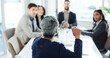 © BuyOutFelix01/peopleimages.com - Speaker, planning and meeting with business people in office for growth strategy, proposal pitch and team. Sales projection, consultant and budget workshop with employees for brainstorming and profit