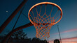 © Yousuf Adnan - Basketball Hoop Silhouette At Dusk With Vibrant Sky Backdrop And Peaceful Serenity