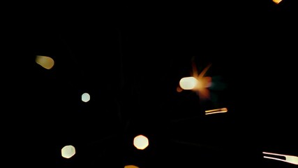 Poster - dazzling sparks displaying brightness and energy in dark background