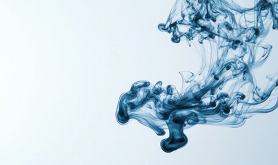 Poster - Elegant blue ink creates swirling, abstract patterns as it disperses in a calming light blue liquid.
