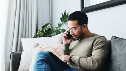 Poster - Phone call, tablet and man on sofa in home for client feedback with freelance job. Cellphone, networking and person with digital technology in living room for mobile discussion with online review.