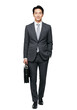 © Wong - Confident businessman walking with a briefcase in a professional setting